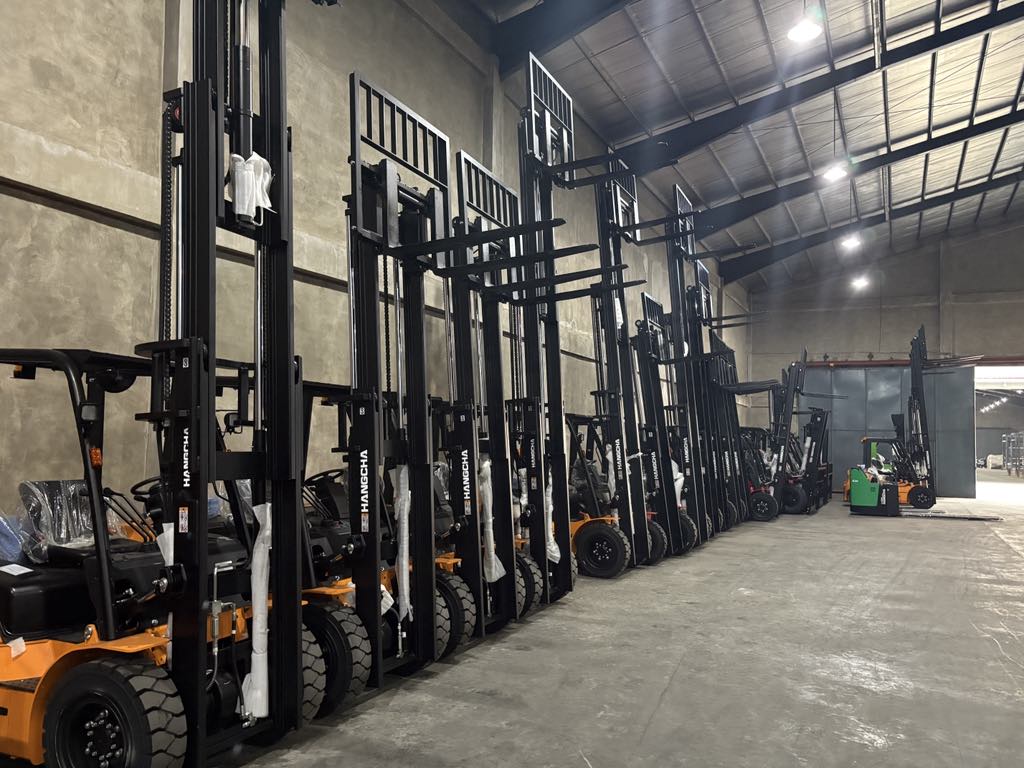 Warehouse showcasing various LIFTTECH forklifts and material handling solutions in the Philippines